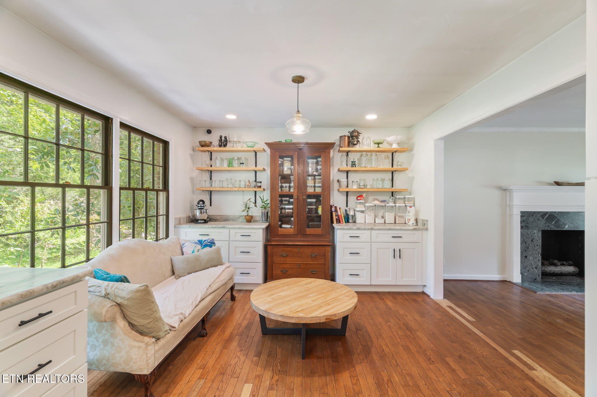 110 Balsam Road Oak Ridge, TN 37830 - Photo 13 of 39 a living room with furniture and a chandelier