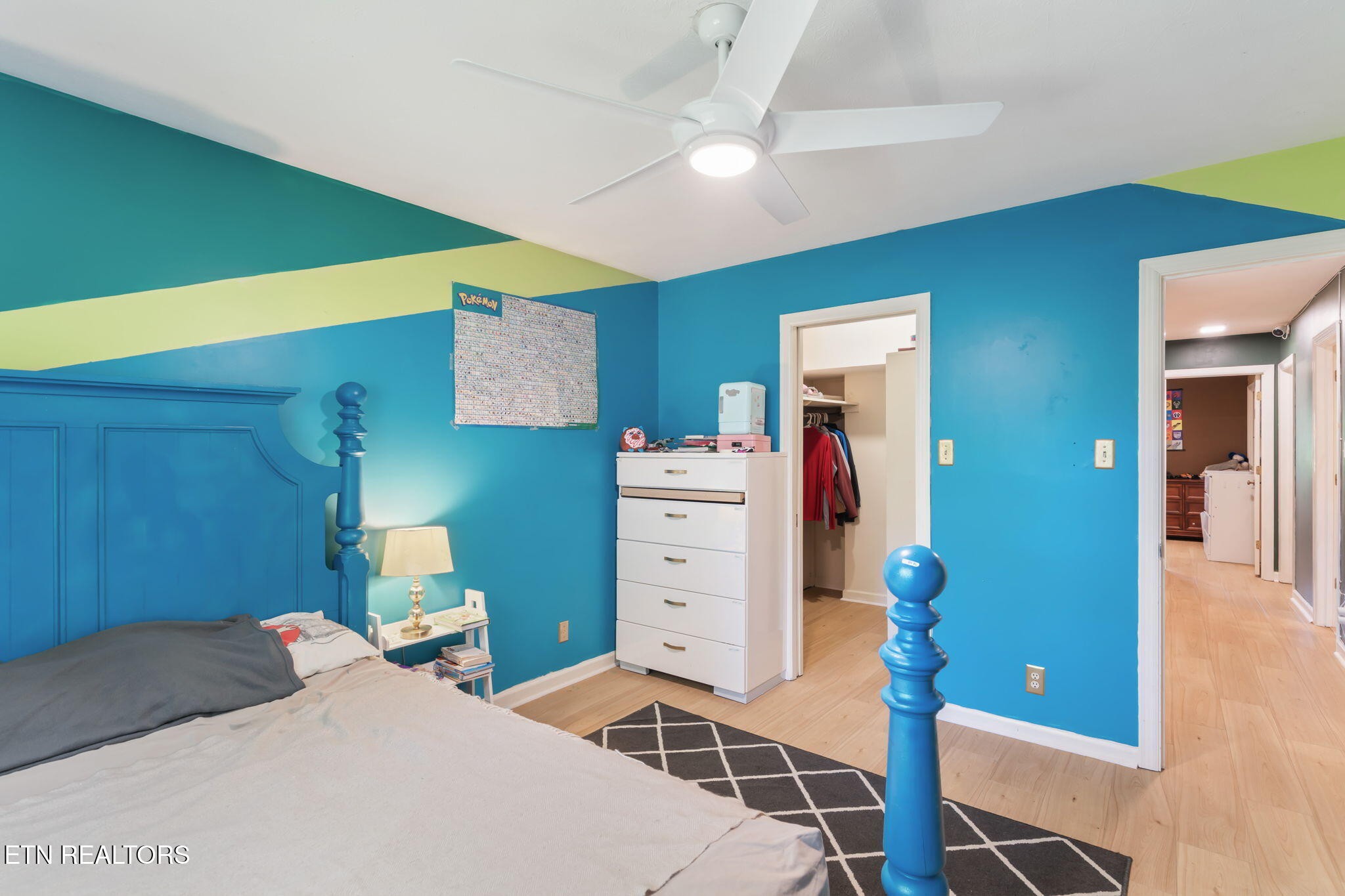 110 Balsam Road Oak Ridge, TN 37830 - Photo 28 of 39 a bedroom with a bed and a cabinets