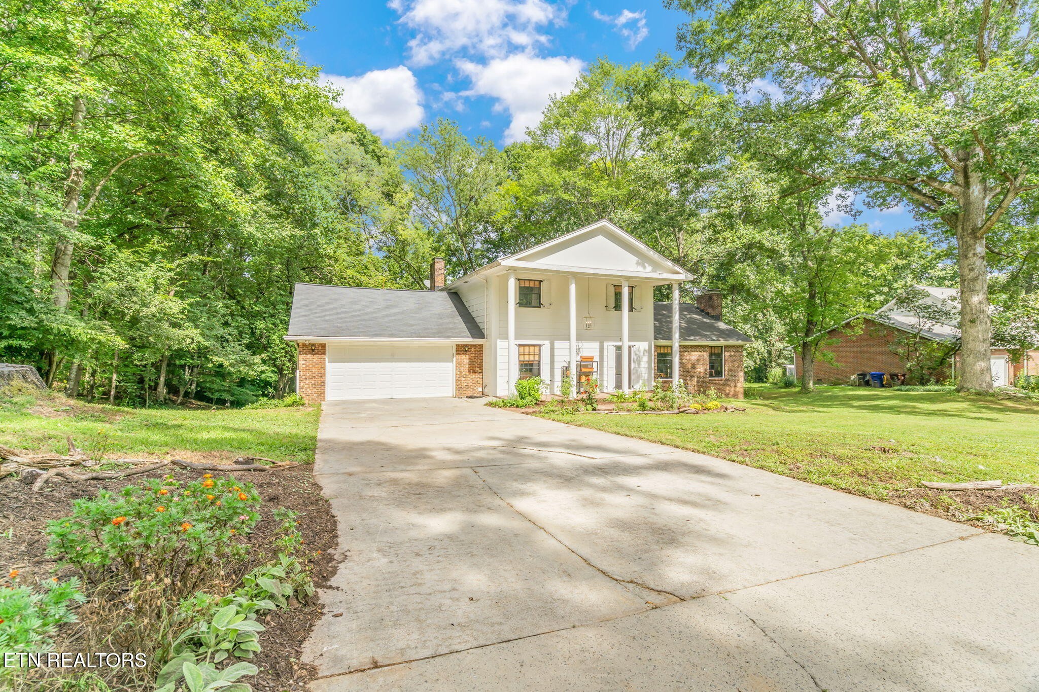 110 Balsam Road Oak Ridge, TN 37830 - Photo 3 of 39 a front view of a house with yard and green space