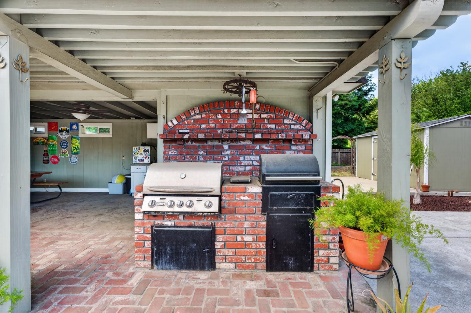 1880 Magnolia Street Gridley, CA 95948 - Photo 59 of 95 a front view of a house with outdoor seating and lots of windows
