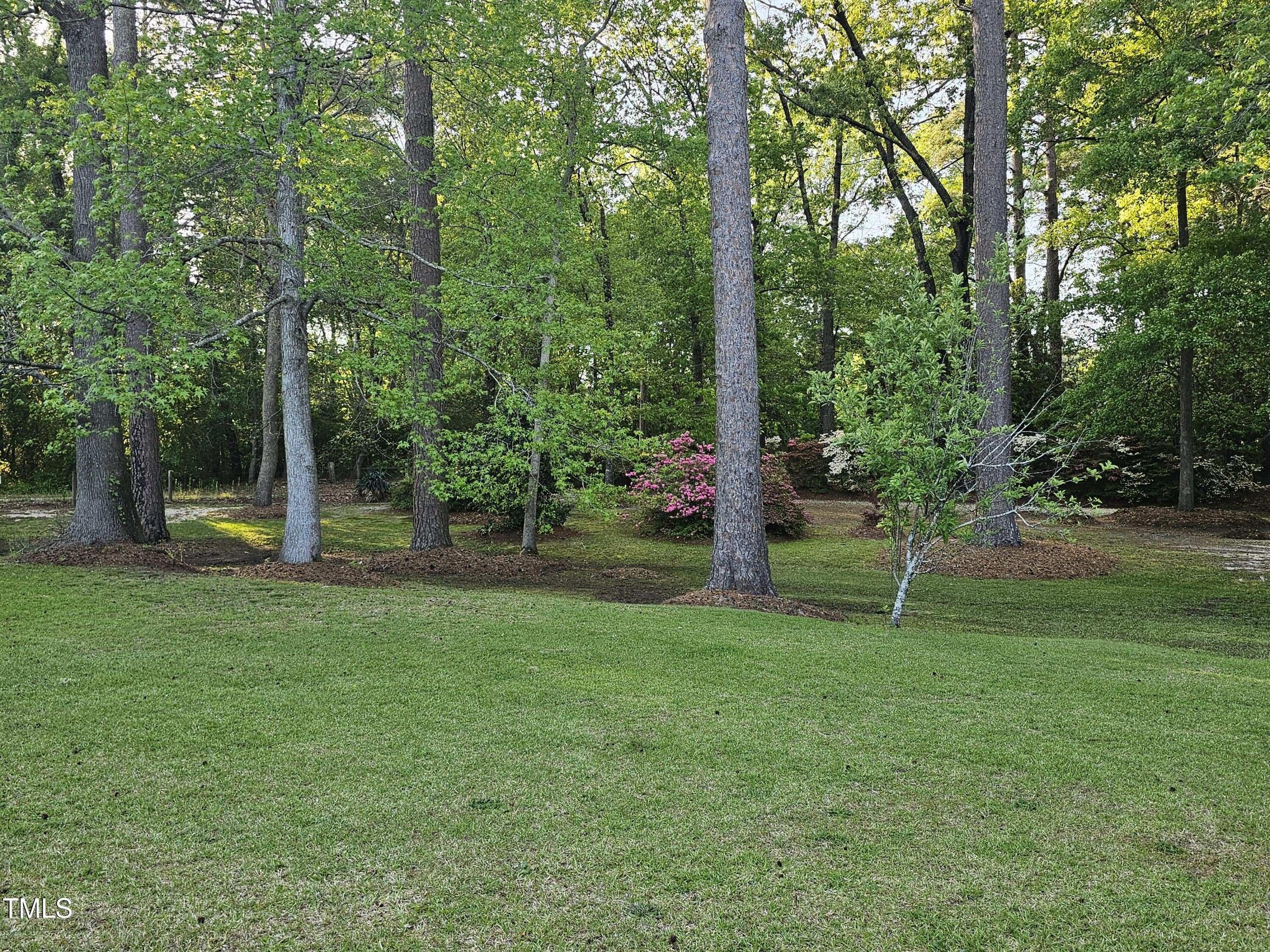 952 Glover Road Dunn, NC 28334 - Photo 31 of 31 a view of a house with a park