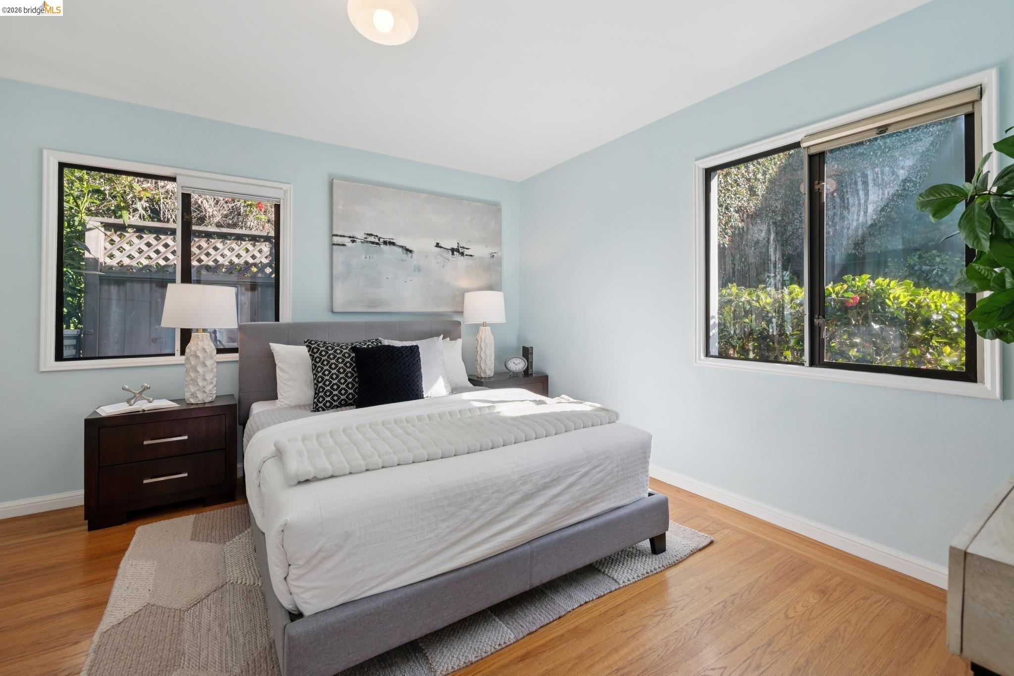 37 Kenyon Avenue Kensington, CA 94708 - Photo 25 of 60 a bedroom with a large bed and a window