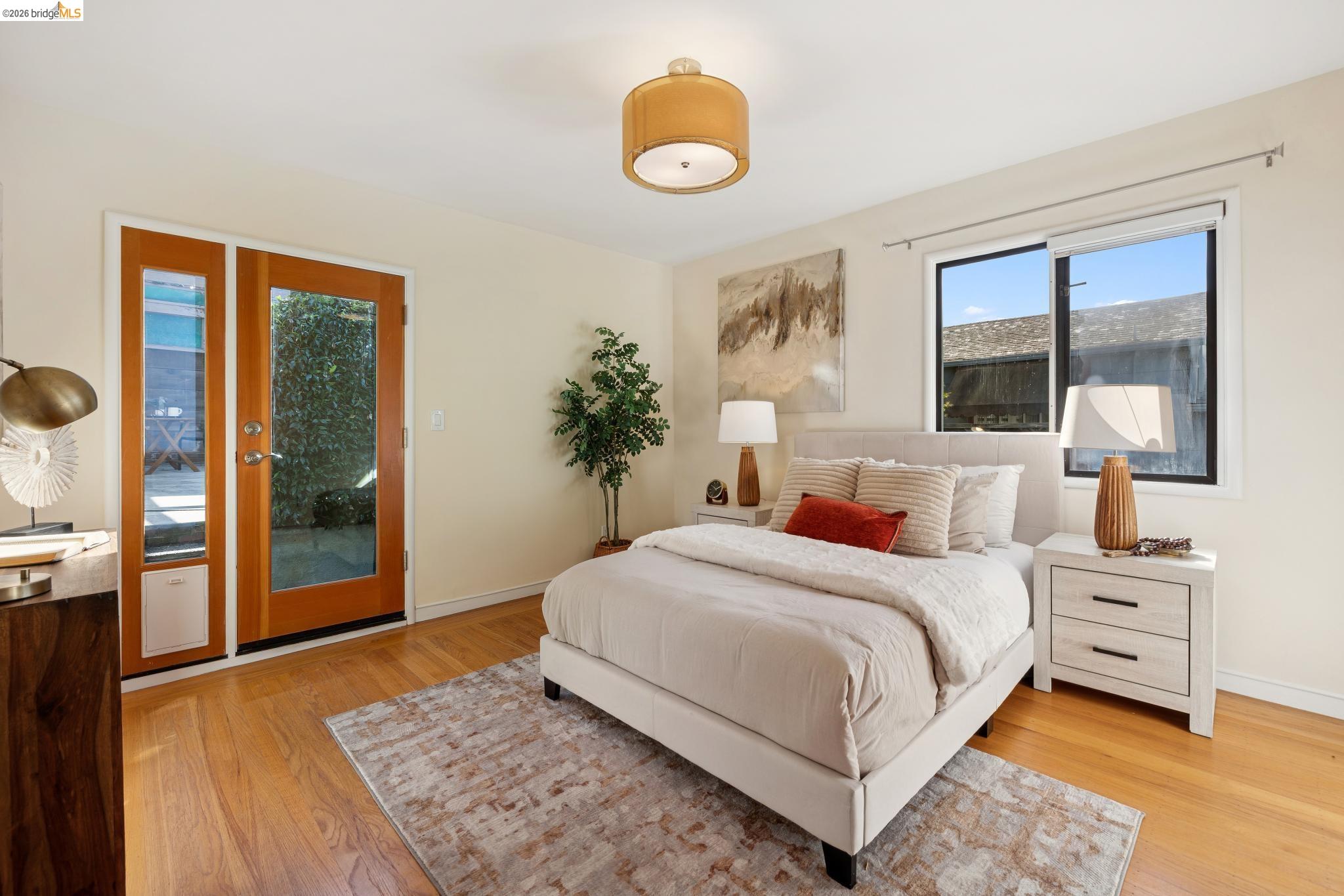 37 Kenyon Avenue Kensington, CA 94708 - Photo 31 of 60 a bedroom with a large bed and a window