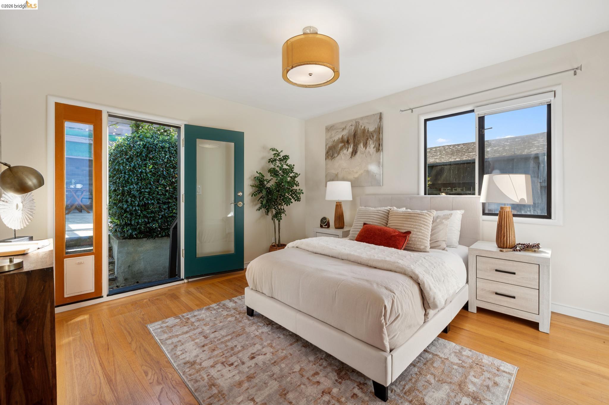 37 Kenyon Avenue Kensington, CA 94708 - Photo 32 of 60 a bedroom with a large bed and a window