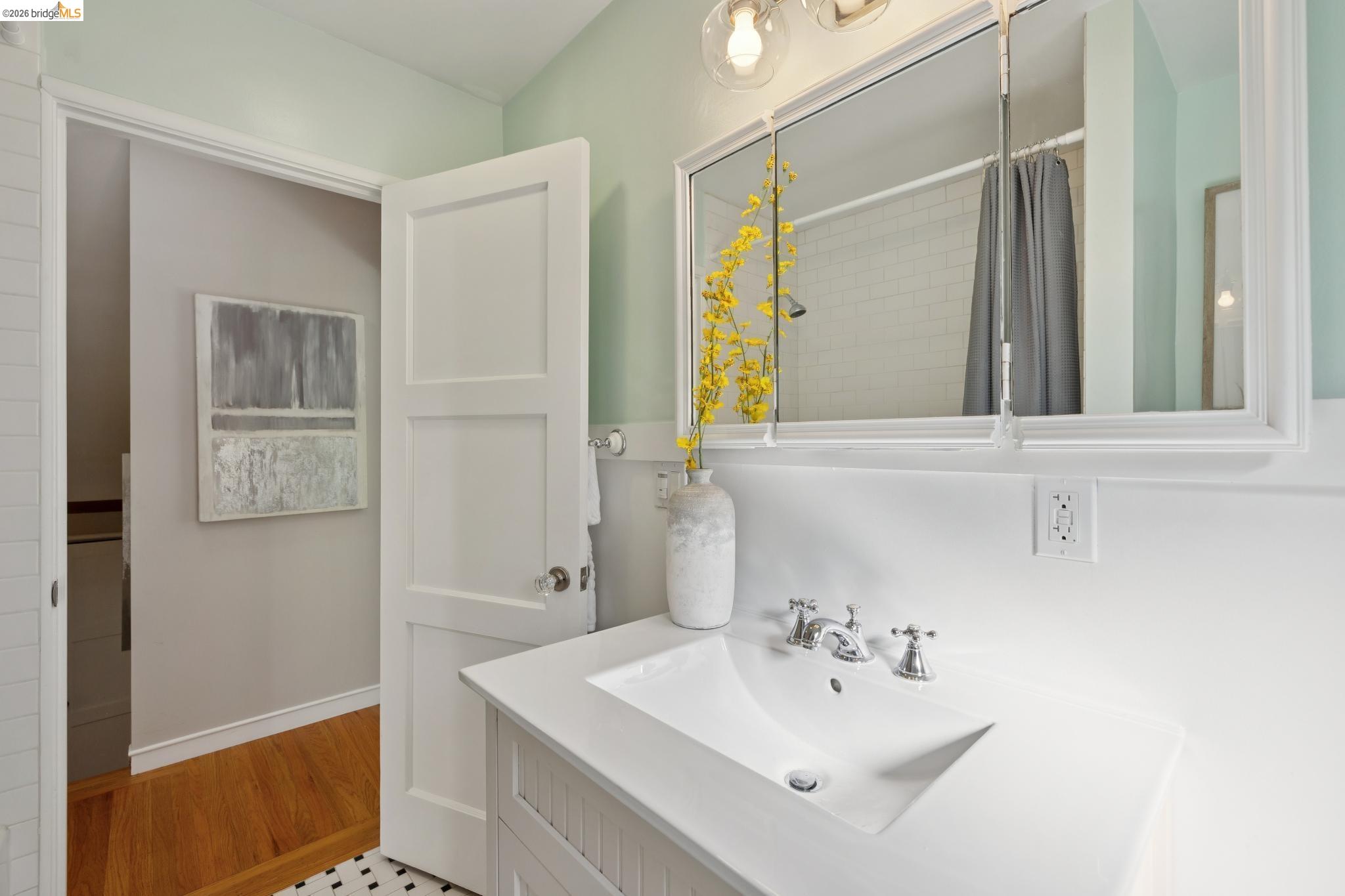 37 Kenyon Avenue Kensington, CA 94708 - Photo 35 of 60 a bathroom with a sink and a mirror