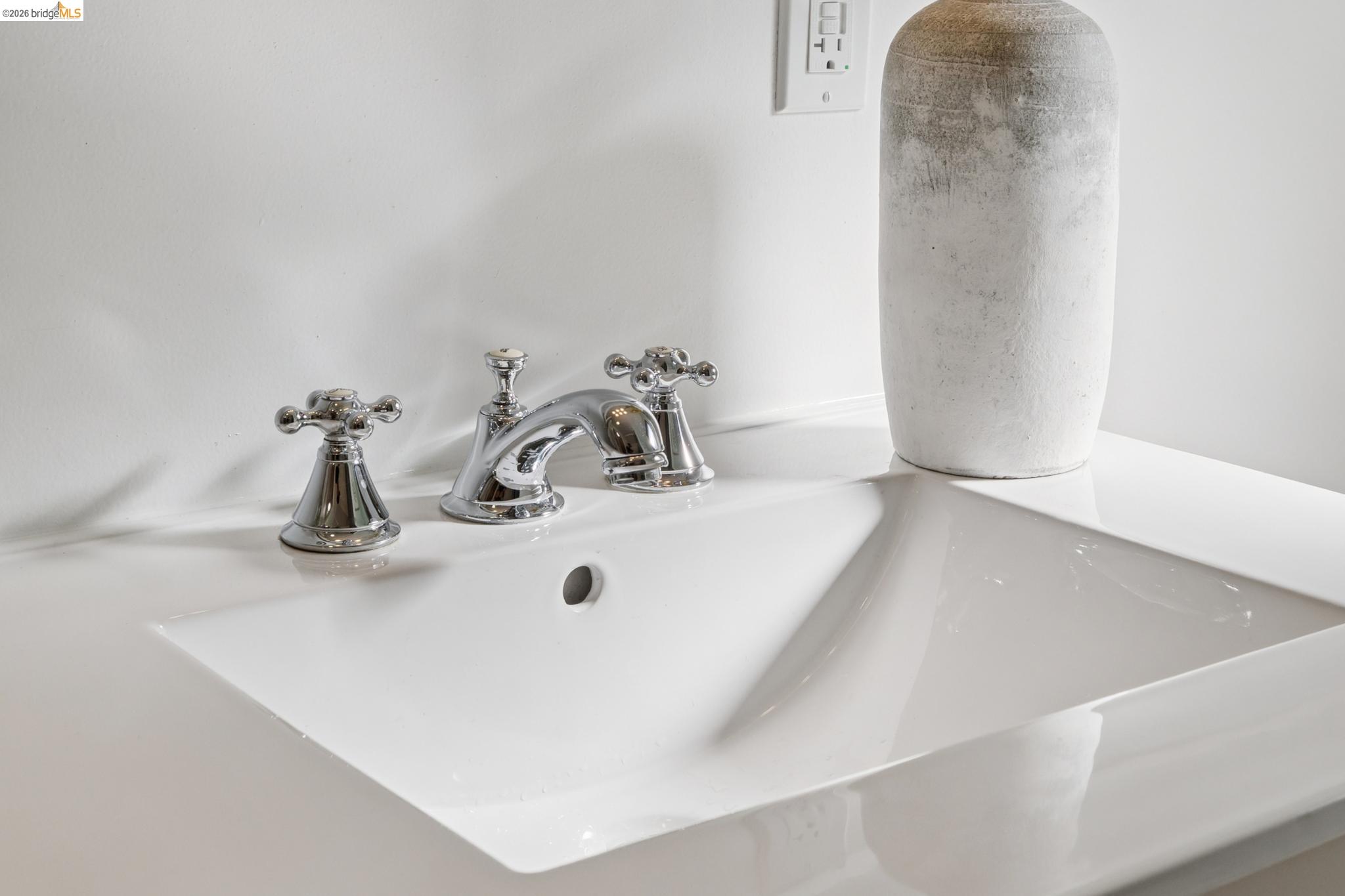 37 Kenyon Avenue Kensington, CA 94708 - Photo 37 of 60 a bathroom with a sink and a mirror