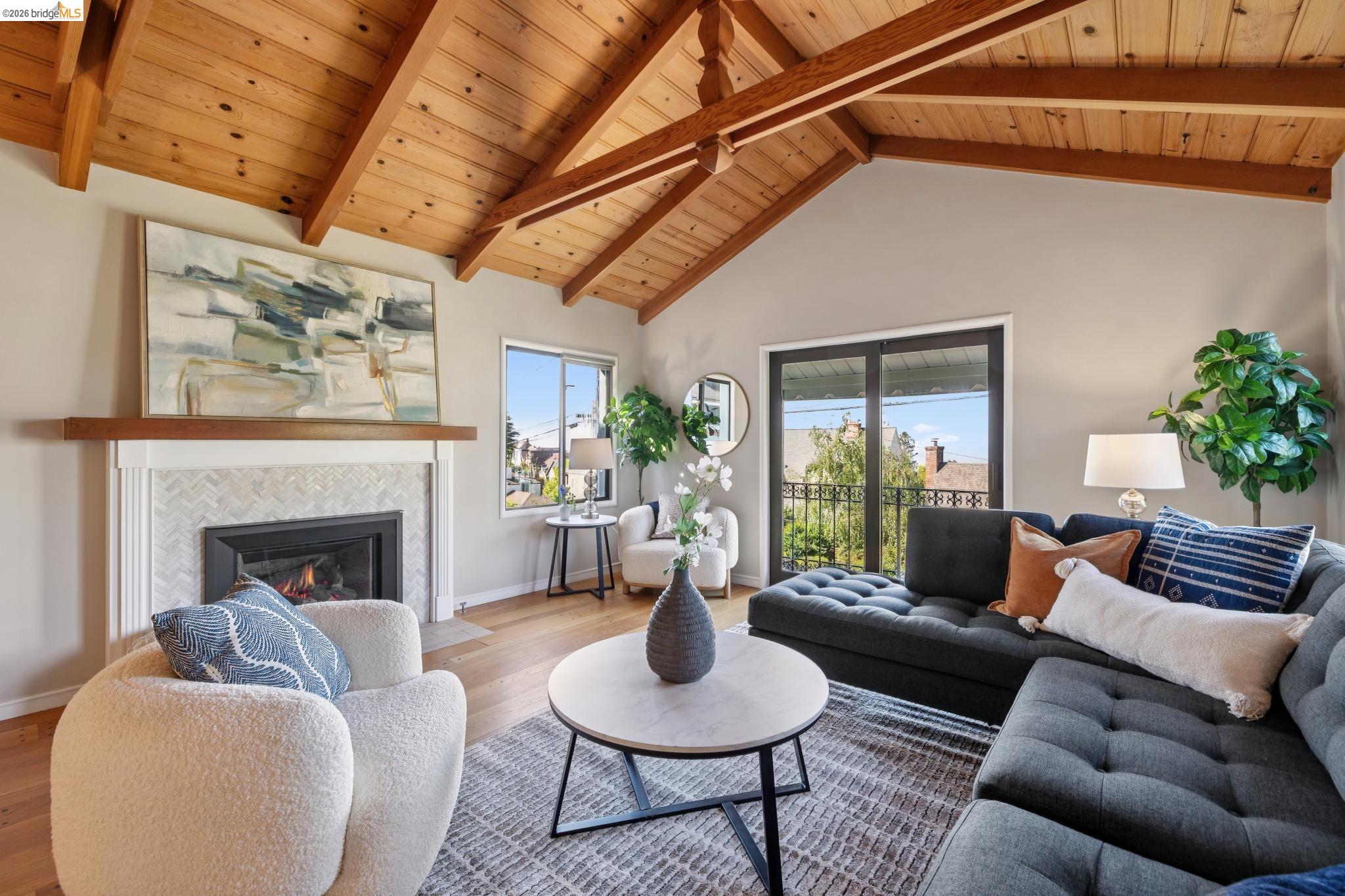 37 Kenyon Avenue Kensington, CA 94708 - Photo 5 of 60 a living room with furniture a fireplace and a potted plant