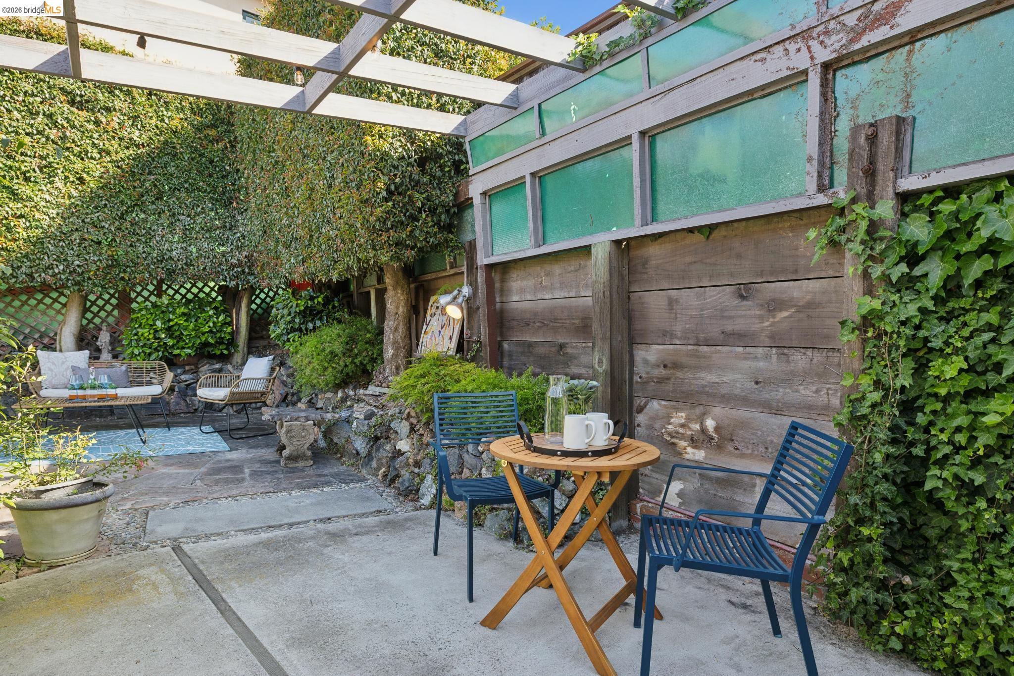 37 Kenyon Avenue Kensington, CA 94708 - Photo 52 of 60 a view of a patio with table and chairs and potted plants
