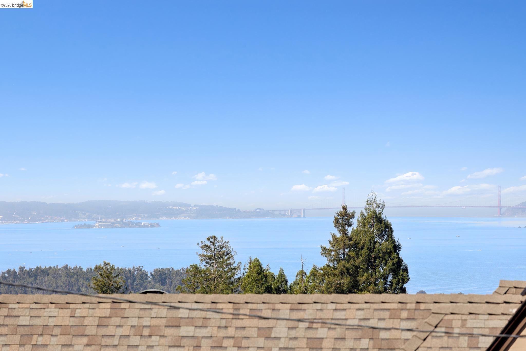 37 Kenyon Avenue Kensington, CA 94708 - Photo 6 of 60 a view of a lake and sunset