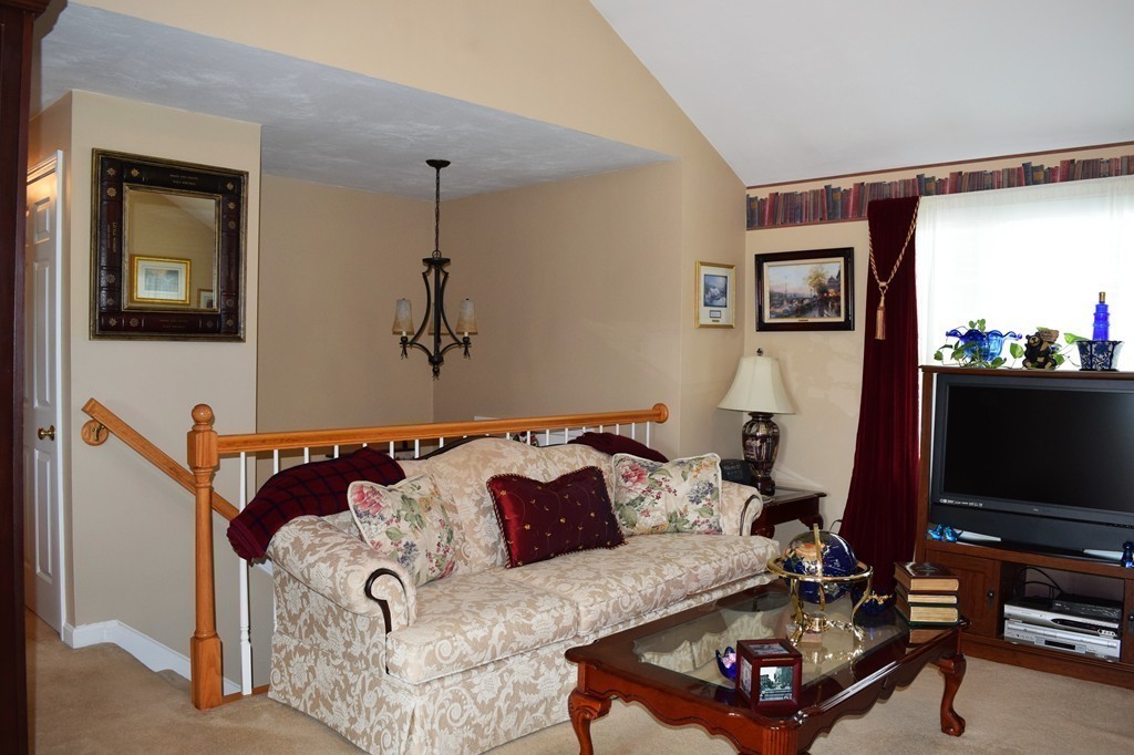 102 Howland Road Freetown, MA 02702 - Photo 12 of 30 a living room with furniture and a flat screen tv