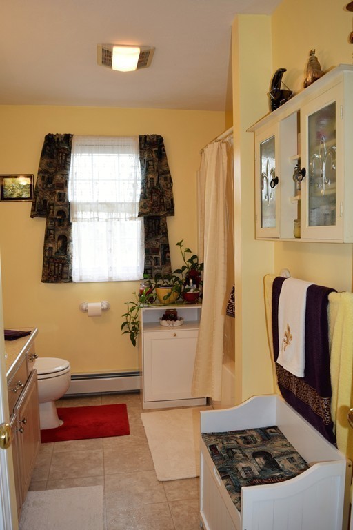 102 Howland Road Freetown, MA 02702 - Photo 15 of 30 a bathroom with a bathtub and a window