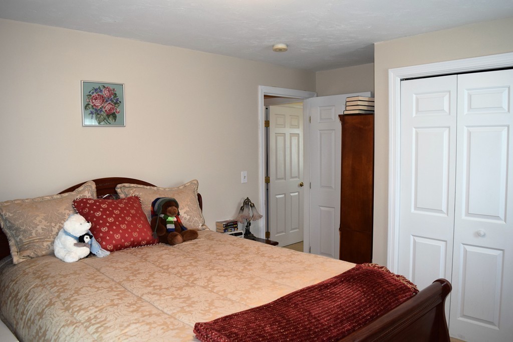 102 Howland Road Freetown, MA 02702 - Photo 16 of 30 a bedroom with a bed and a window