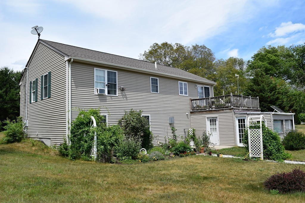 102 Howland Road Freetown, MA 02702 - Photo 25 of 30 a front view of a house with a yard