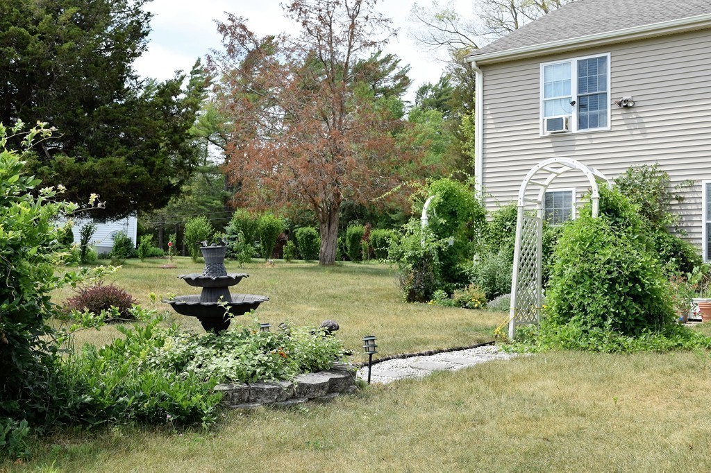 102 Howland Road Freetown, MA 02702 - Photo 26 of 30 a view of backyard with green space