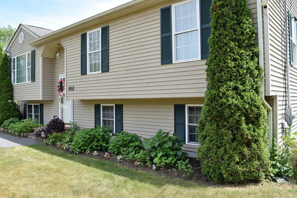 102 Howland Road Freetown, MA 02702 - Photo 3 of 30 a front view of a house with garden