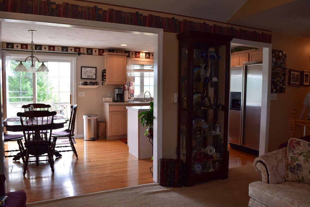 102 Howland Road Freetown, MA 02702 - Photo 7 of 30 a view of a dining room with furniture window and wooden floor