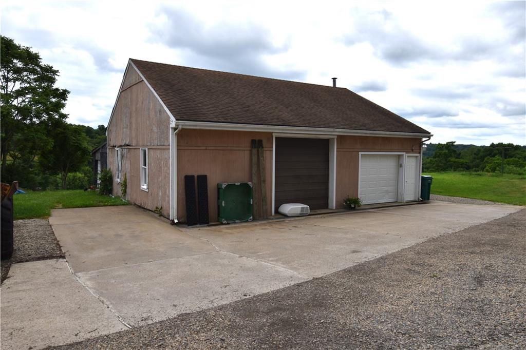 628 Patterson Road Apollo, PA 15613 - Photo 4 of 17 a front view of house with yard and trees in the background
