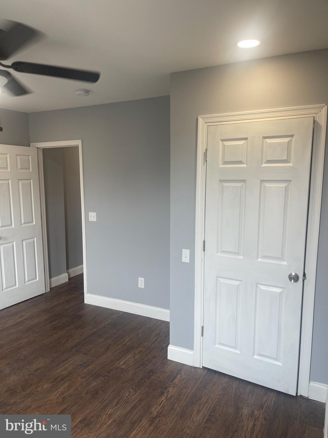 5618 Appletree Street, Unit 2 Philadelphia, PA 19139 - Photo 4 of 11 a view of an empty room with wooden floor