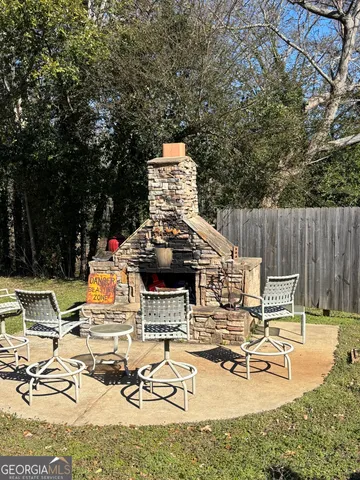 a bathroom with a toilet a sink and bathtub