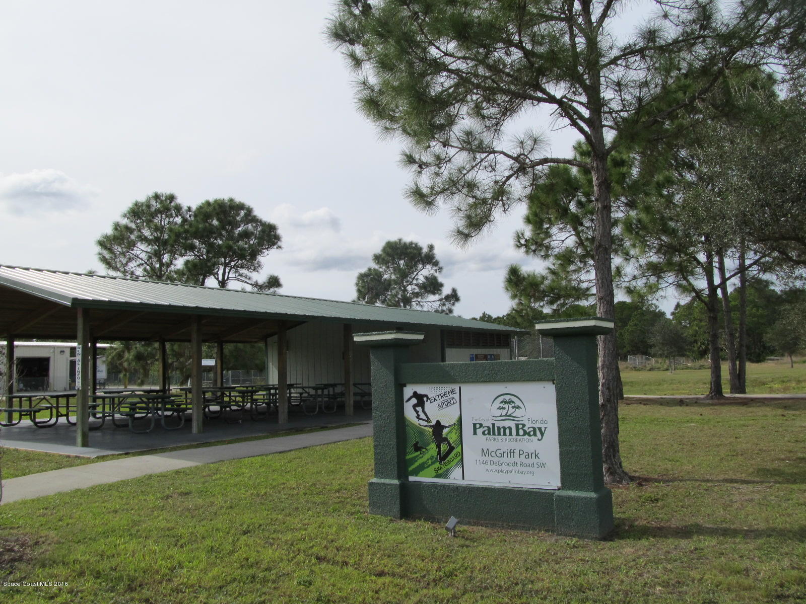 1140 Sexton Road Southwest Palm Bay, FL 32908 - Photo 18 of 20 a view of outdoor space with sign board