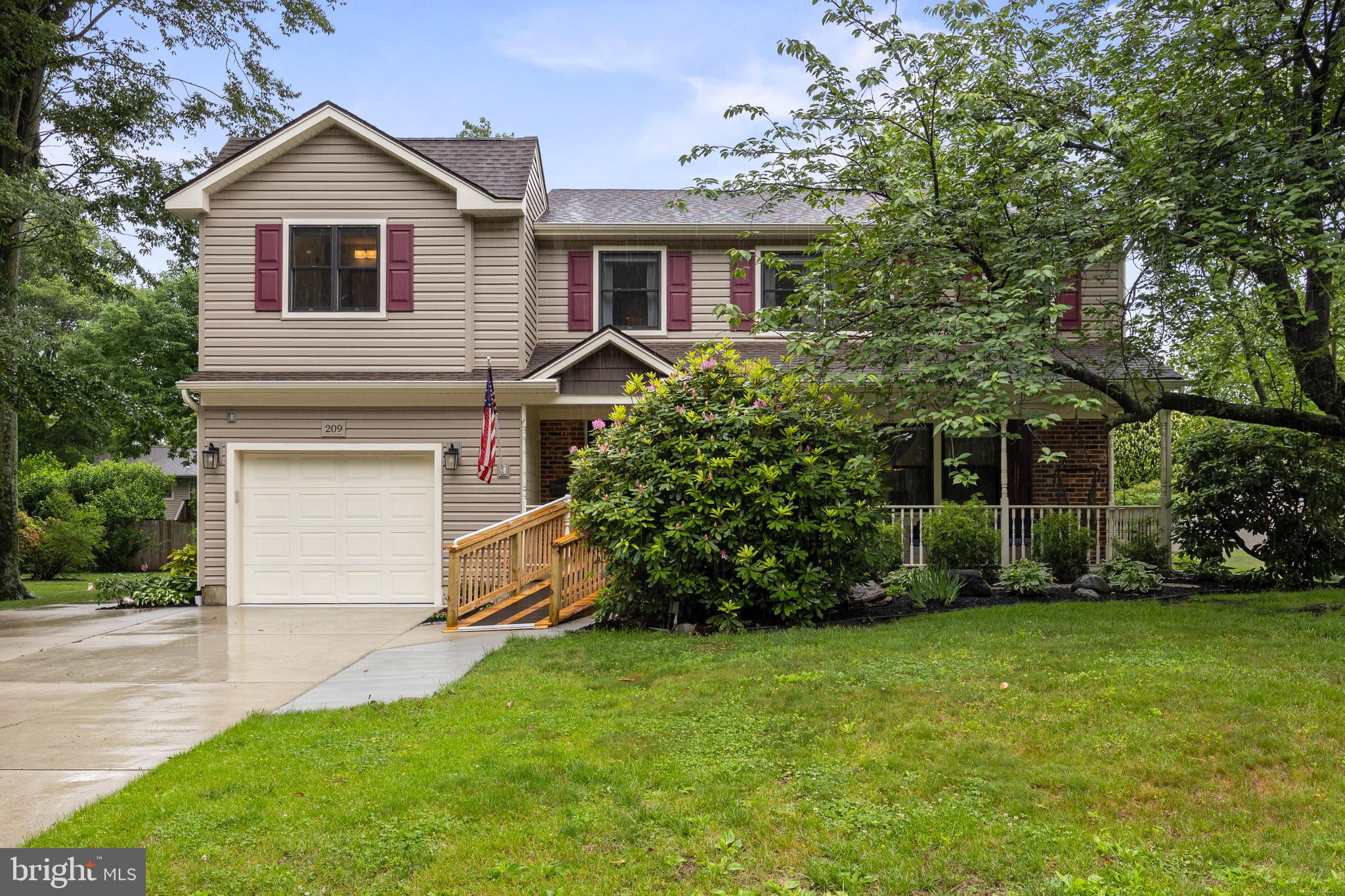 front view of a house with a yard
