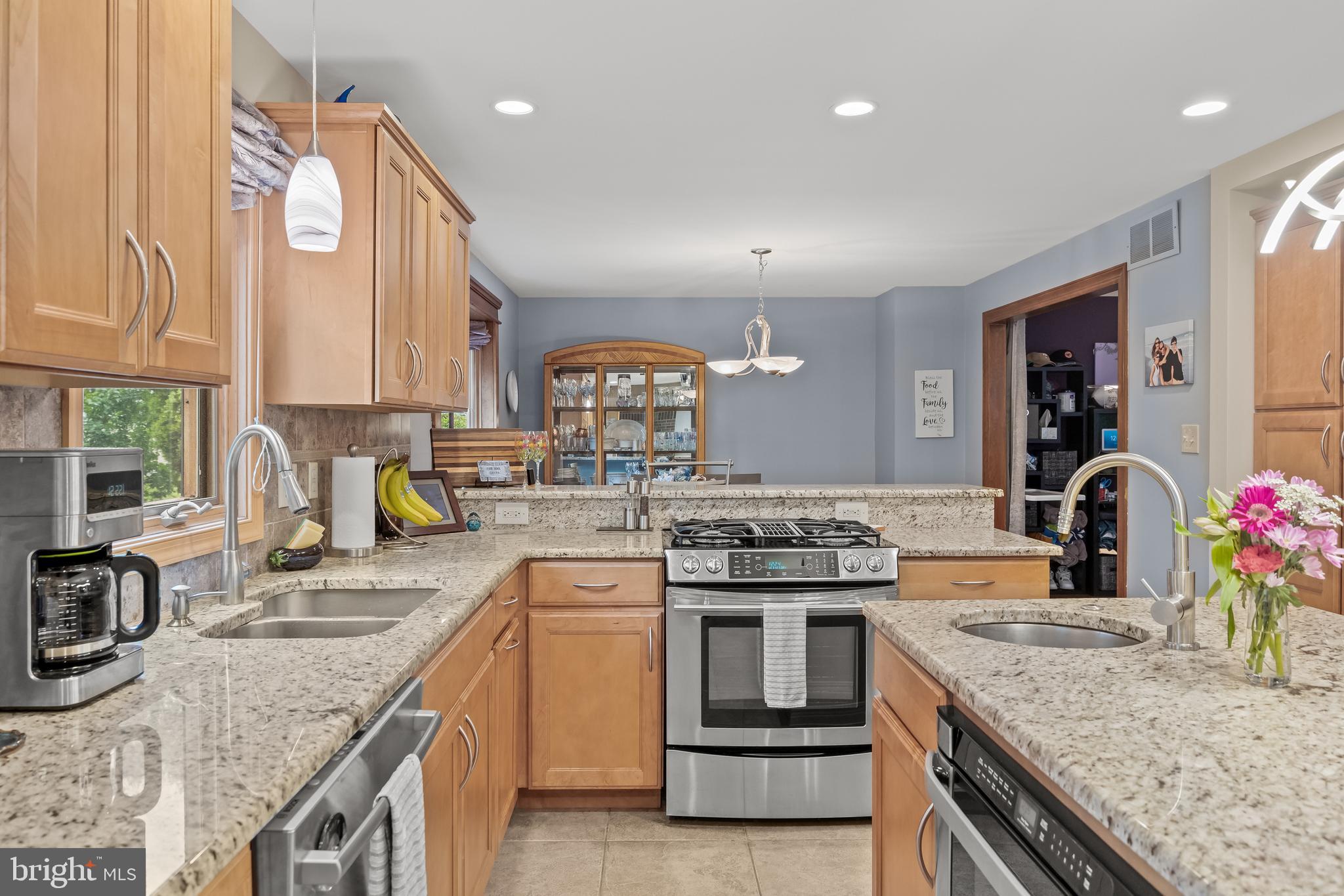 209 Tinder Marlton, NJ 08053 - Photo 13 of 47 a kitchen with a stove sink and cabinets