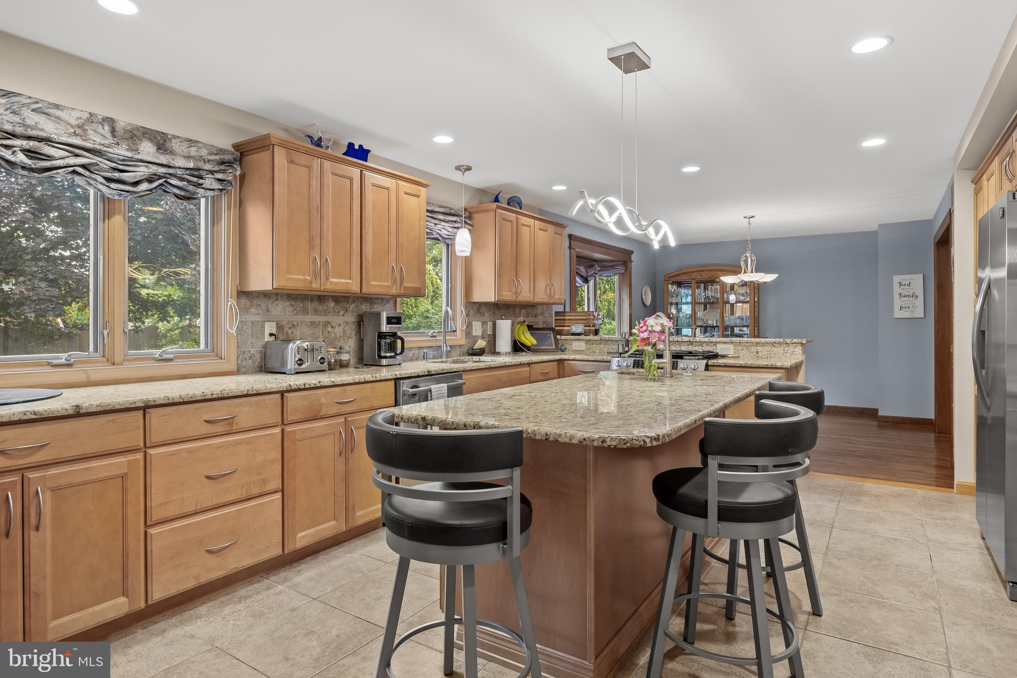 209 Tinder Marlton, NJ 08053 - Photo 14 of 47 a kitchen with stainless steel appliances granite countertop a sink and a refrigerator