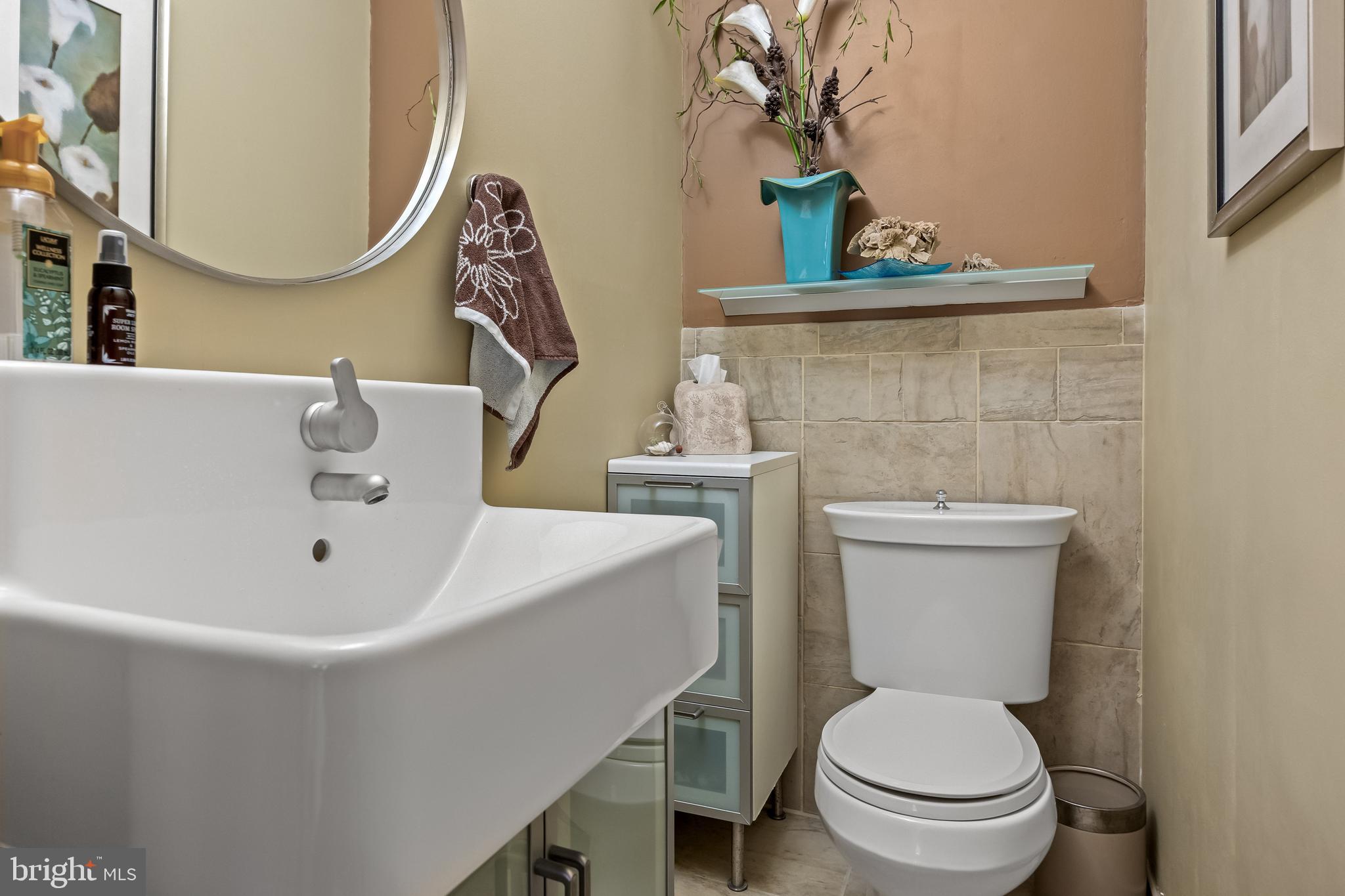 209 Tinder Marlton, NJ 08053 - Photo 19 of 47 a white toilet sitting next to a bathroom sink