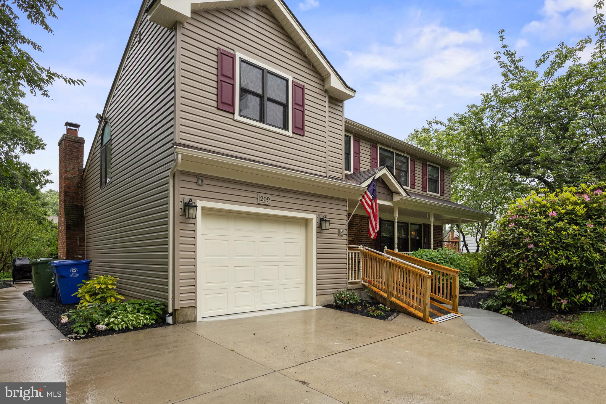 209 Tinder Marlton, NJ 08053 - Photo 2 of 47 a front view of a house with garden