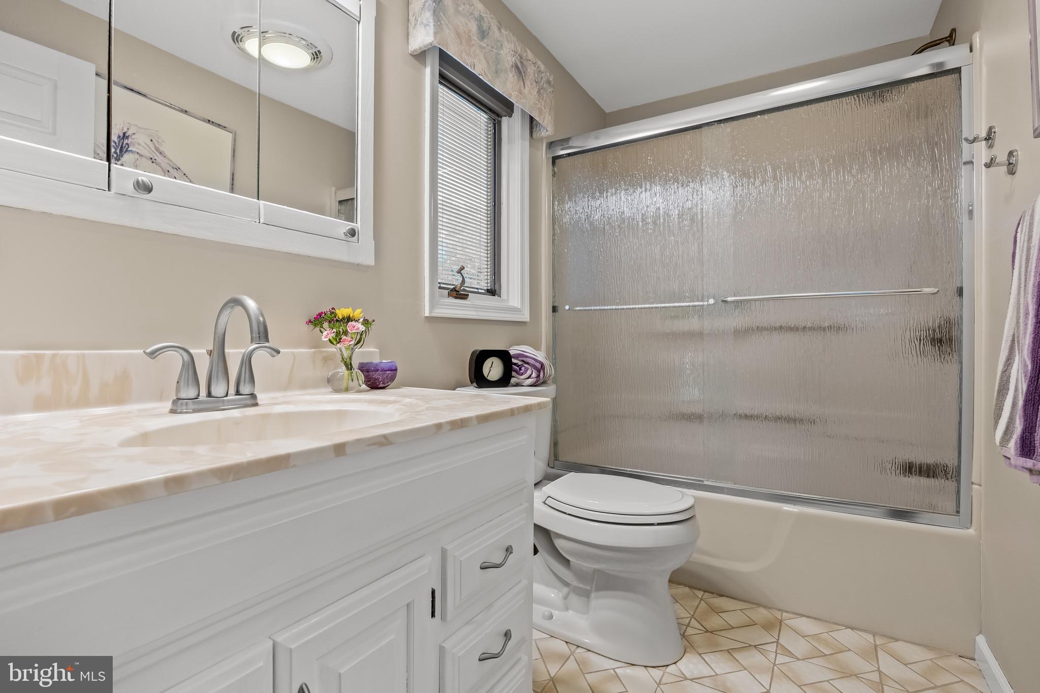 209 Tinder Marlton, NJ 08053 - Photo 22 of 47 a bathroom with a sink toilet and shower