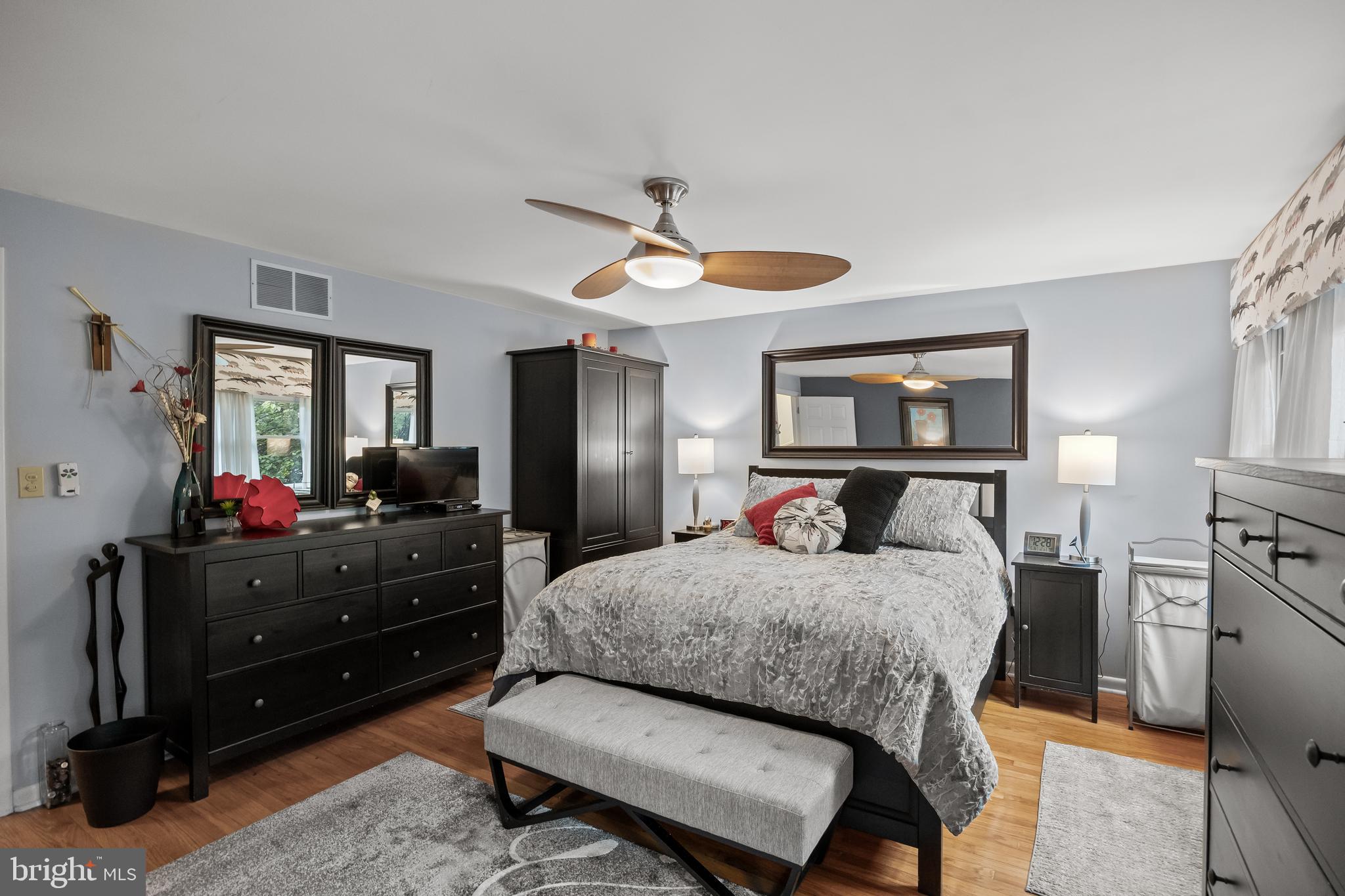 209 Tinder Marlton, NJ 08053 - Photo 24 of 47 a bedroom with a bed window and a mirror on dresser