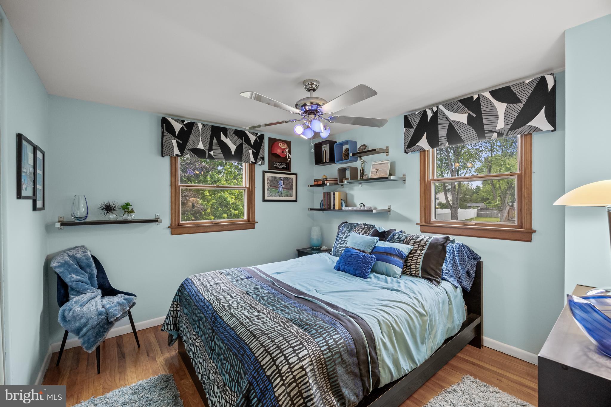 209 Tinder Marlton, NJ 08053 - Photo 30 of 47 a bedroom with a bed and wooden floor