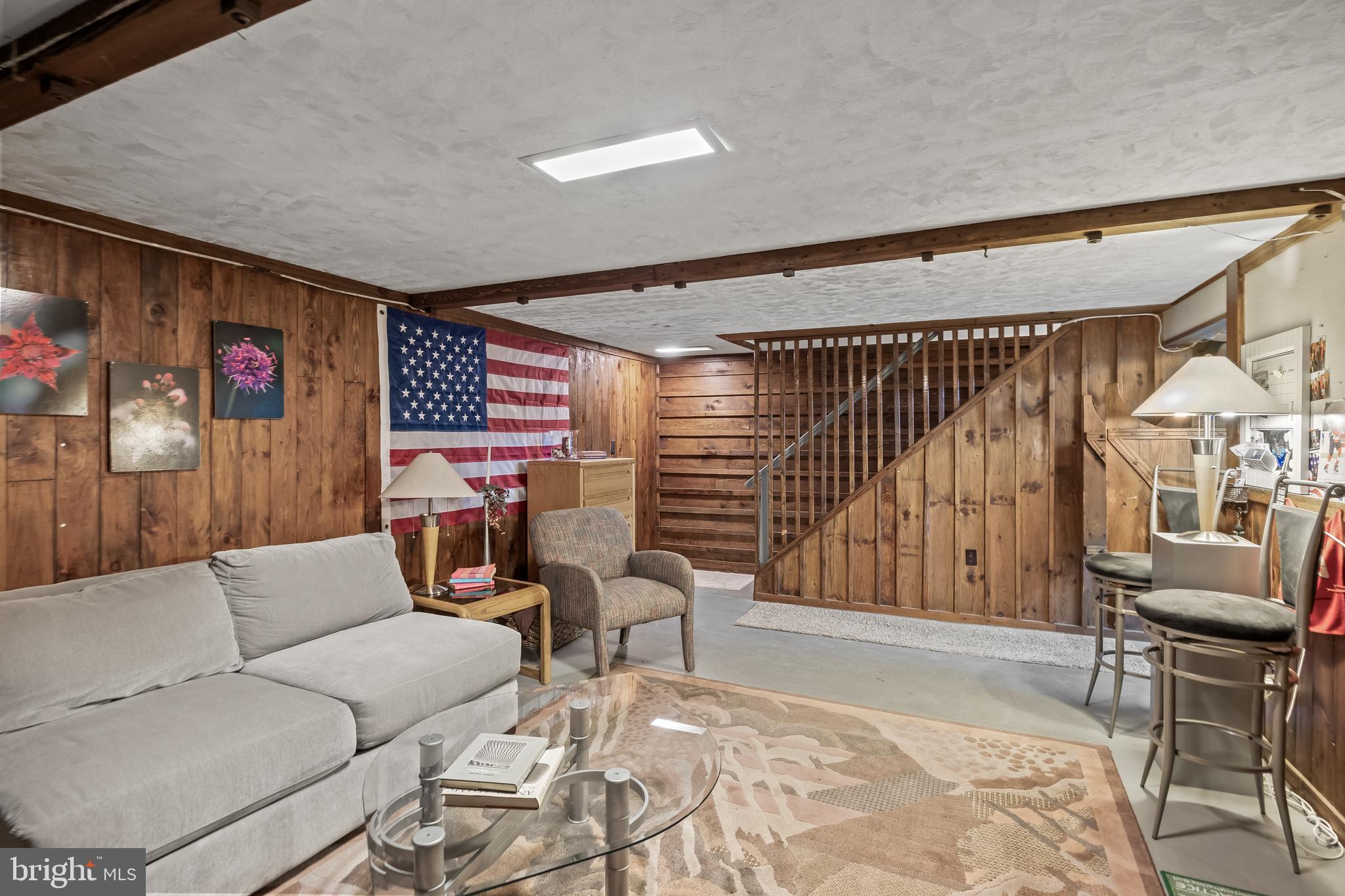209 Tinder Marlton, NJ 08053 - Photo 33 of 47 a living room with furniture and a flat screen tv