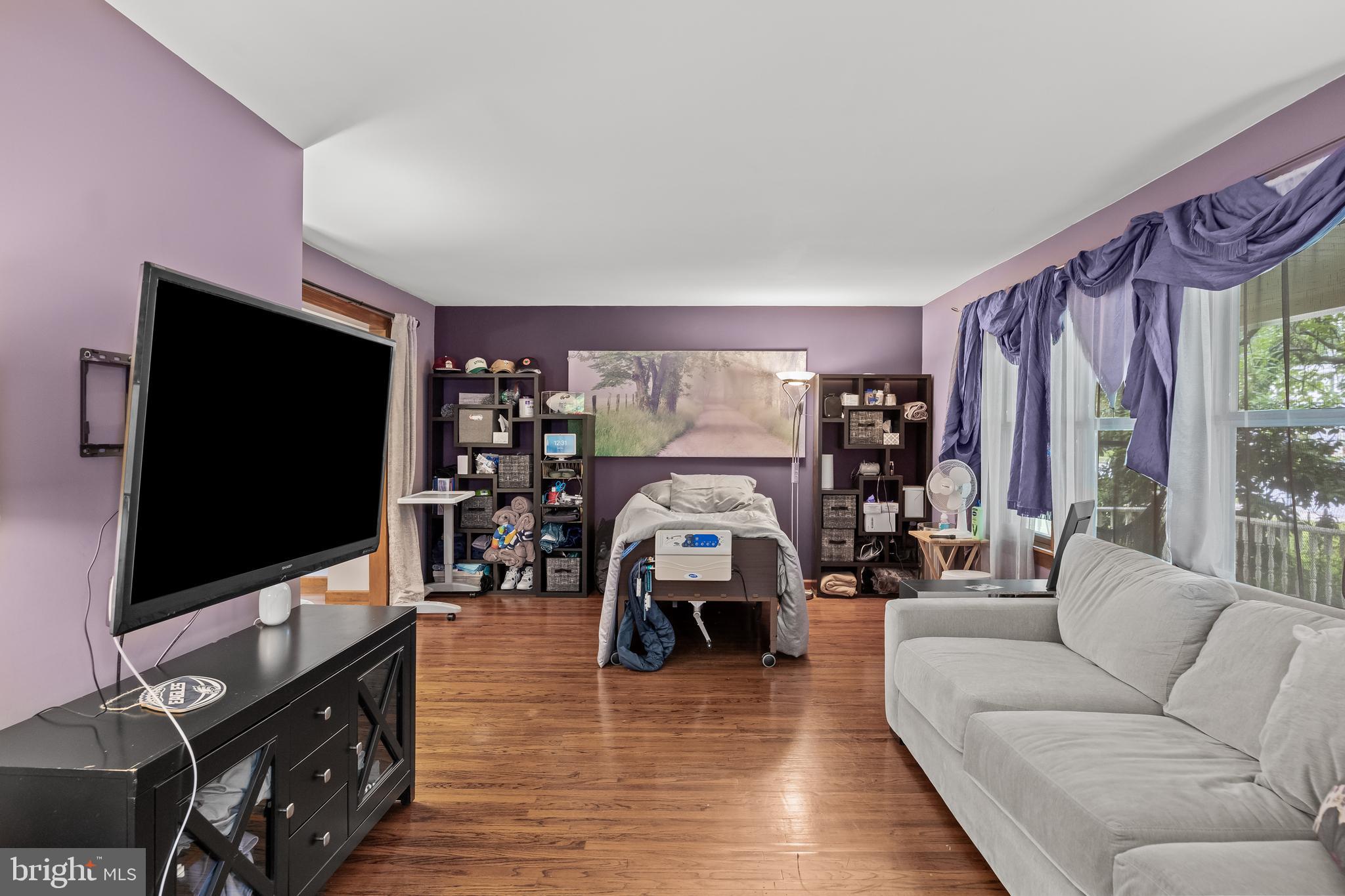 209 Tinder Marlton, NJ 08053 - Photo 5 of 47 a living room with furniture and a flat screen tv