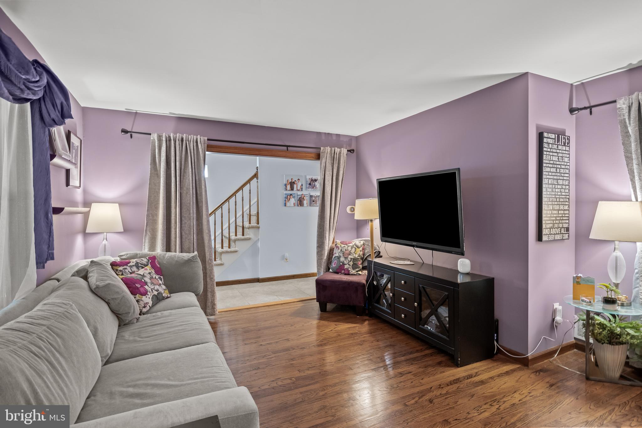 209 Tinder Marlton, NJ 08053 - Photo 7 of 47 a living room with furniture and a flat screen tv