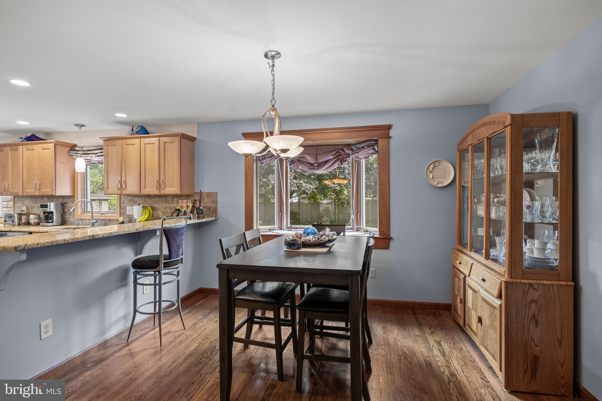 209 Tinder Marlton, NJ 08053 - Photo 8 of 47 a view of a dining room with furniture window and wooden floor