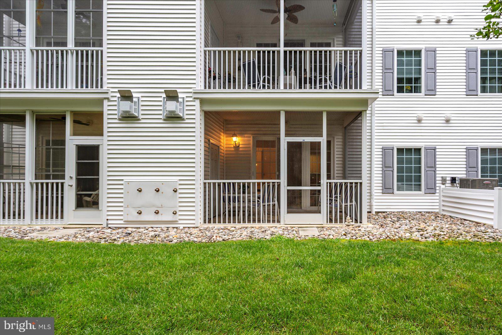 30611 Cedar Neck Road, Unit 2107 Ocean View, DE 19970 - Photo 32 of 44 a front view of a house