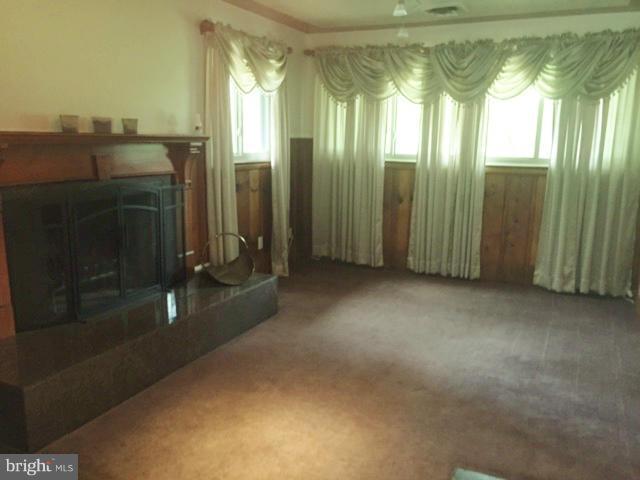 9403 Brandywine Road Clinton, MD 20735 - Photo 23 of 30 Den w/ Wood Burning Fireplace, Carpet