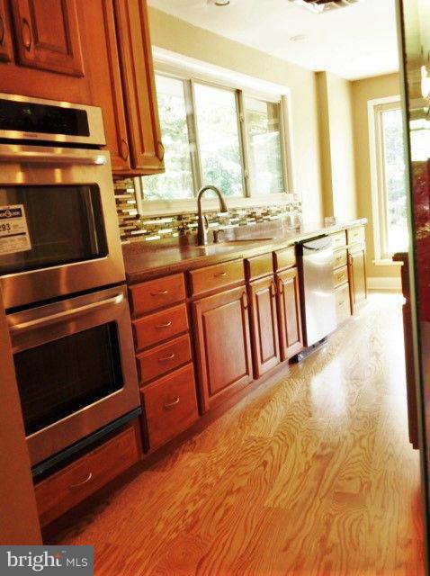 9403 Brandywine Road Clinton, MD 20735 - Photo 9 of 30 Kitchen Has New HWD Flooring