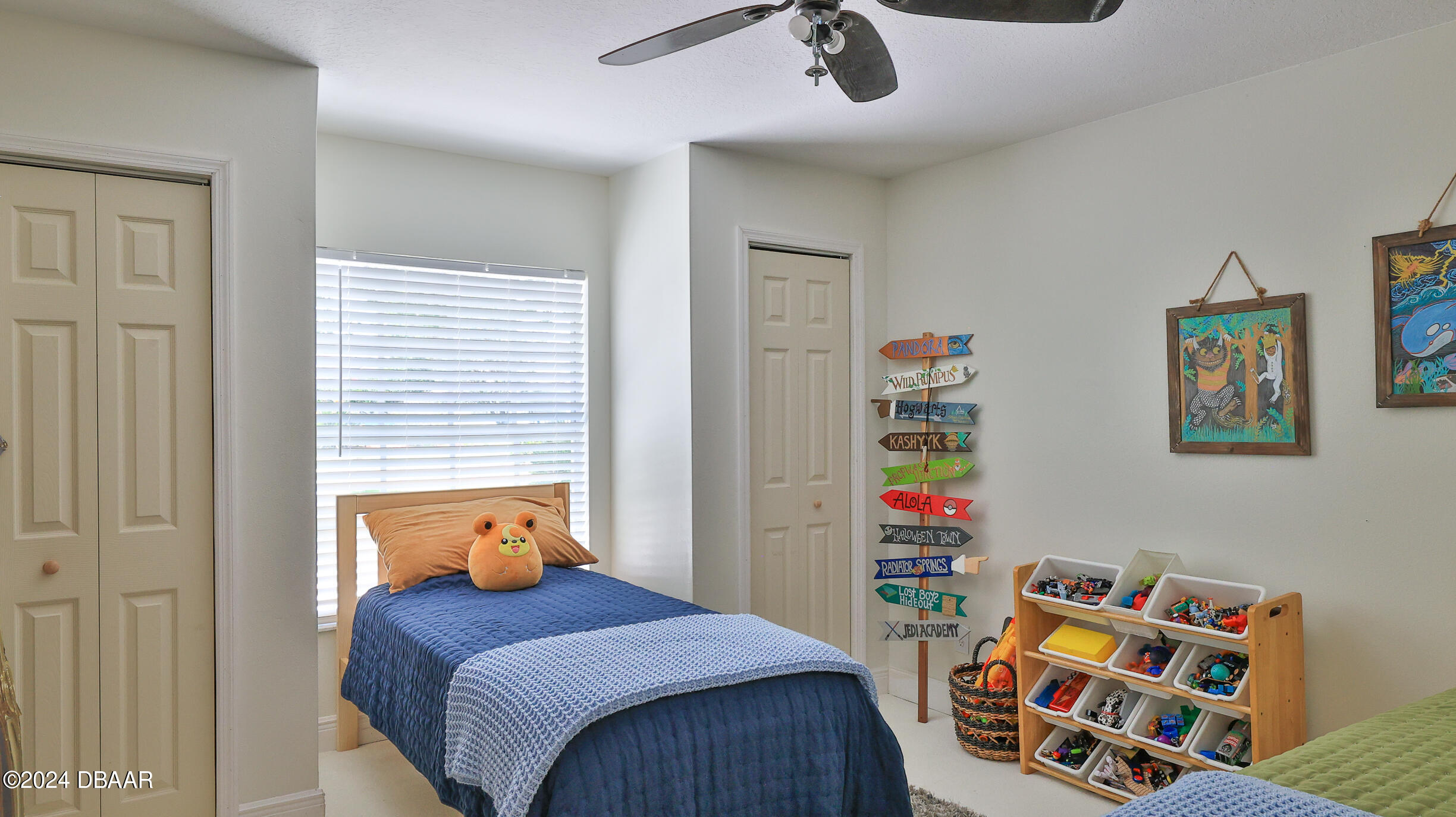 16 Meadow Ridge View Ormond Beach, FL 32174 - Photo 30 of 45 a bedroom with a bed and wooden floor