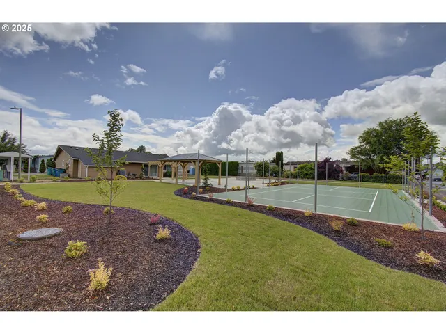 a view of swimming pool with outdoor seating