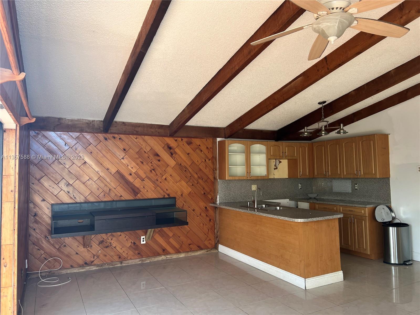 The Hammocks Miami, FL 33186 - Photo 12 of 28 a kitchen with a sink and a stove top oven