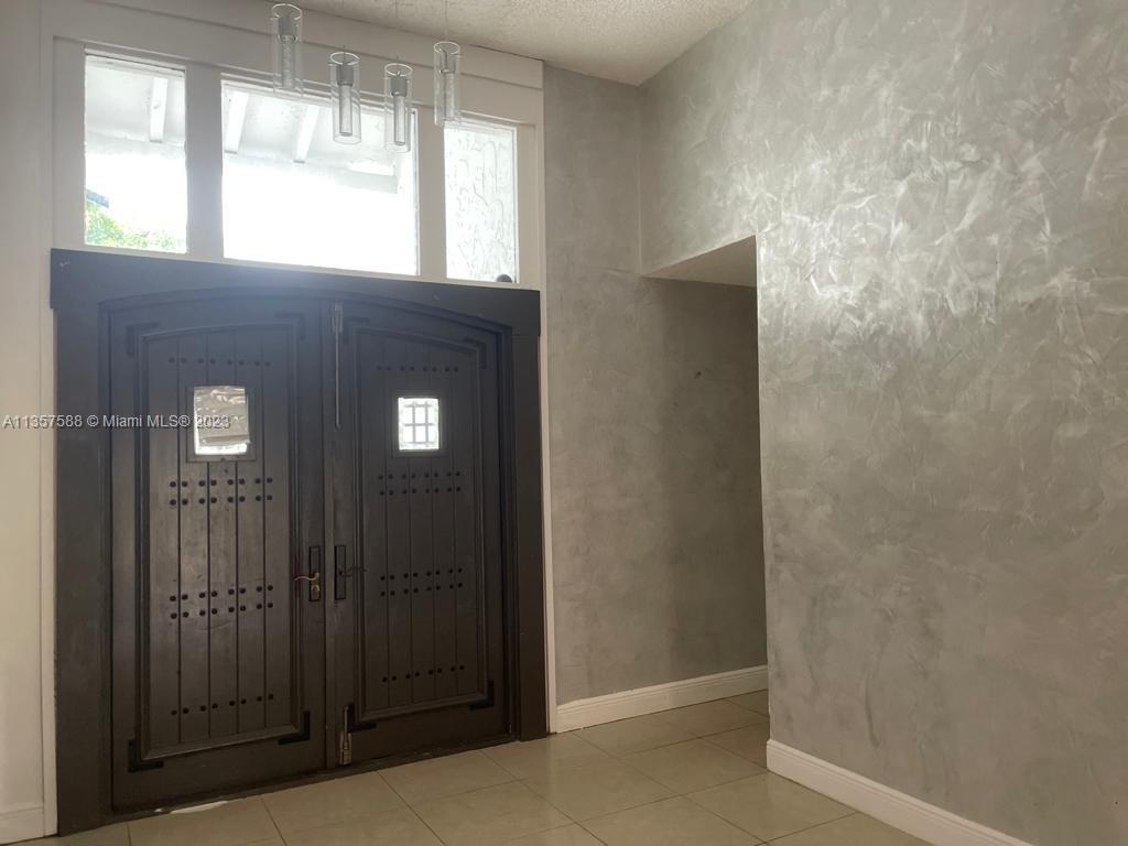 The Hammocks Miami, FL 33186 - Photo 5 of 28 a view of an empty room with bathroom and a window