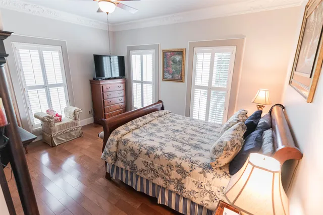 a bathroom with a sink mirror vanity and toilet