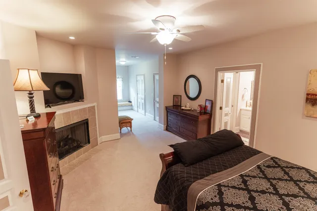 a spacious bathroom with a double vanity sink and a mirror