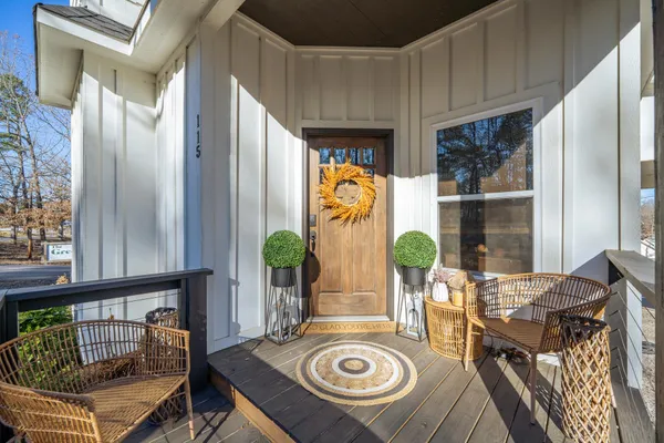 a view of a house with wooden floor and a large window