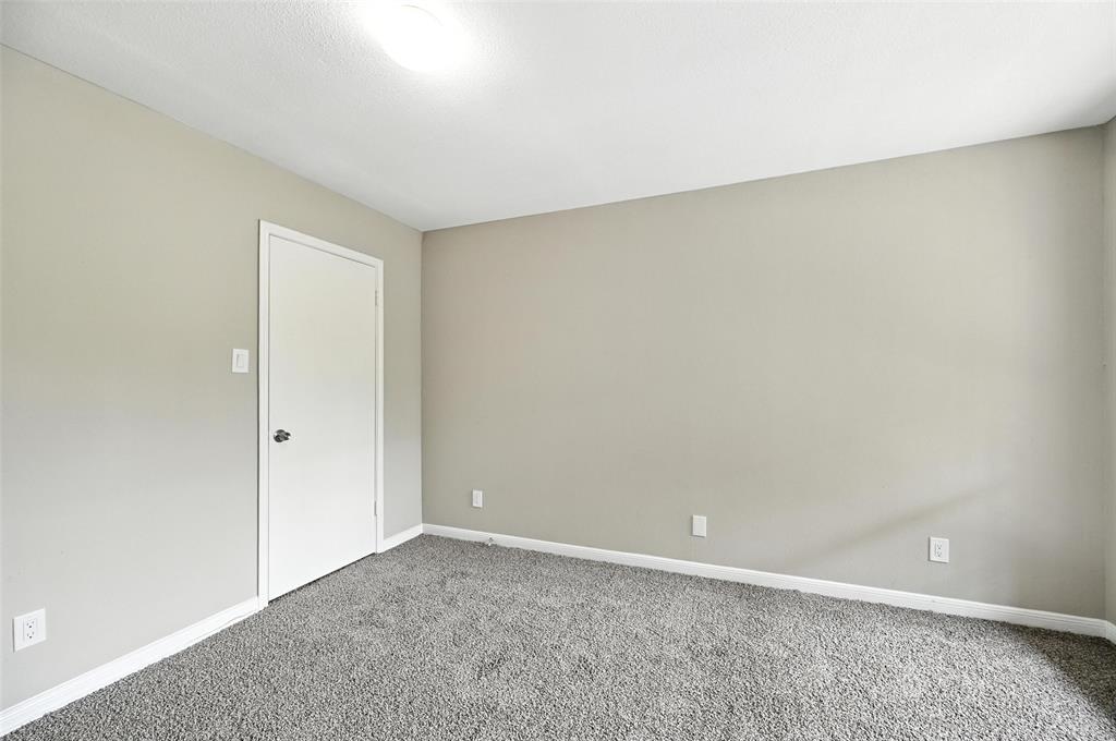 8545 Midpark Road, Unit 66 Dallas, TX 75240 - Photo 13 of 27 a view of an empty room