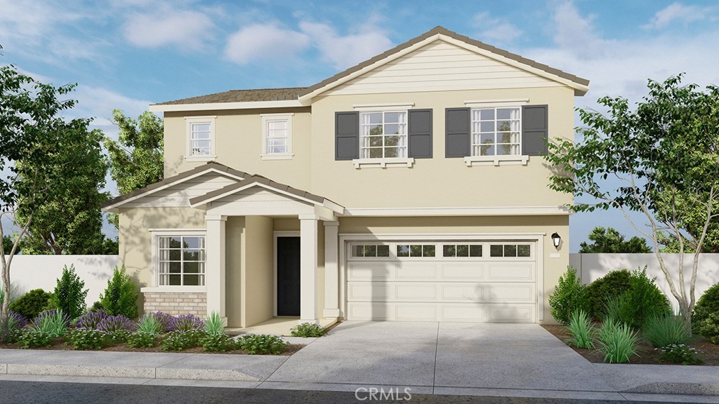 a view of a yard in front view of a house