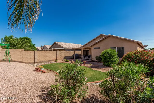 a house view with a garden space