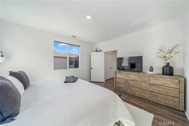 a bathroom with double vanity sink and a mirror